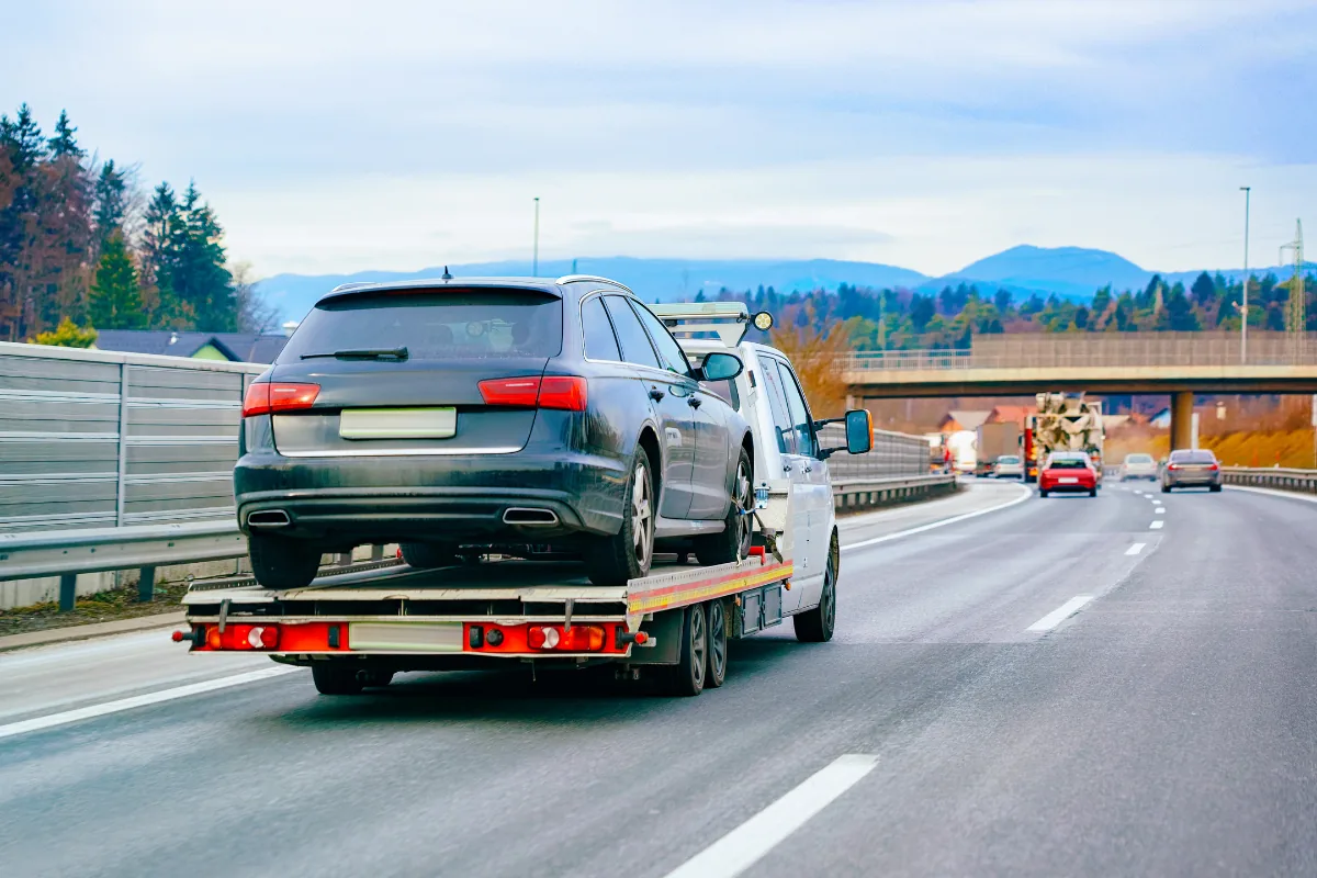 Vehicle transport service with a car being moved by T1T